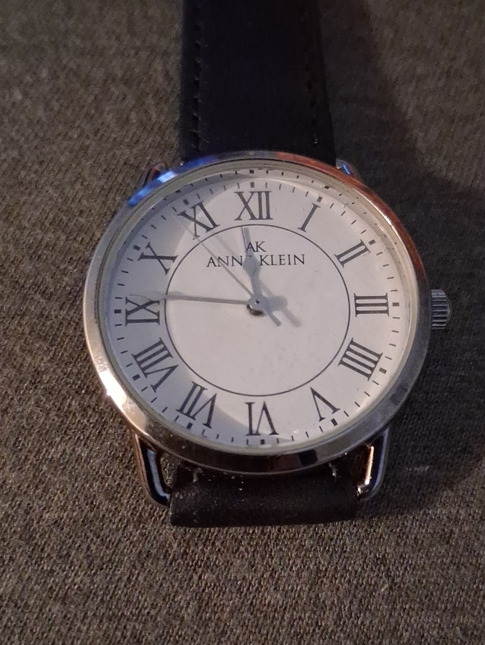Anne Klein Silver Case White Dial Watch with Black Leather Strap